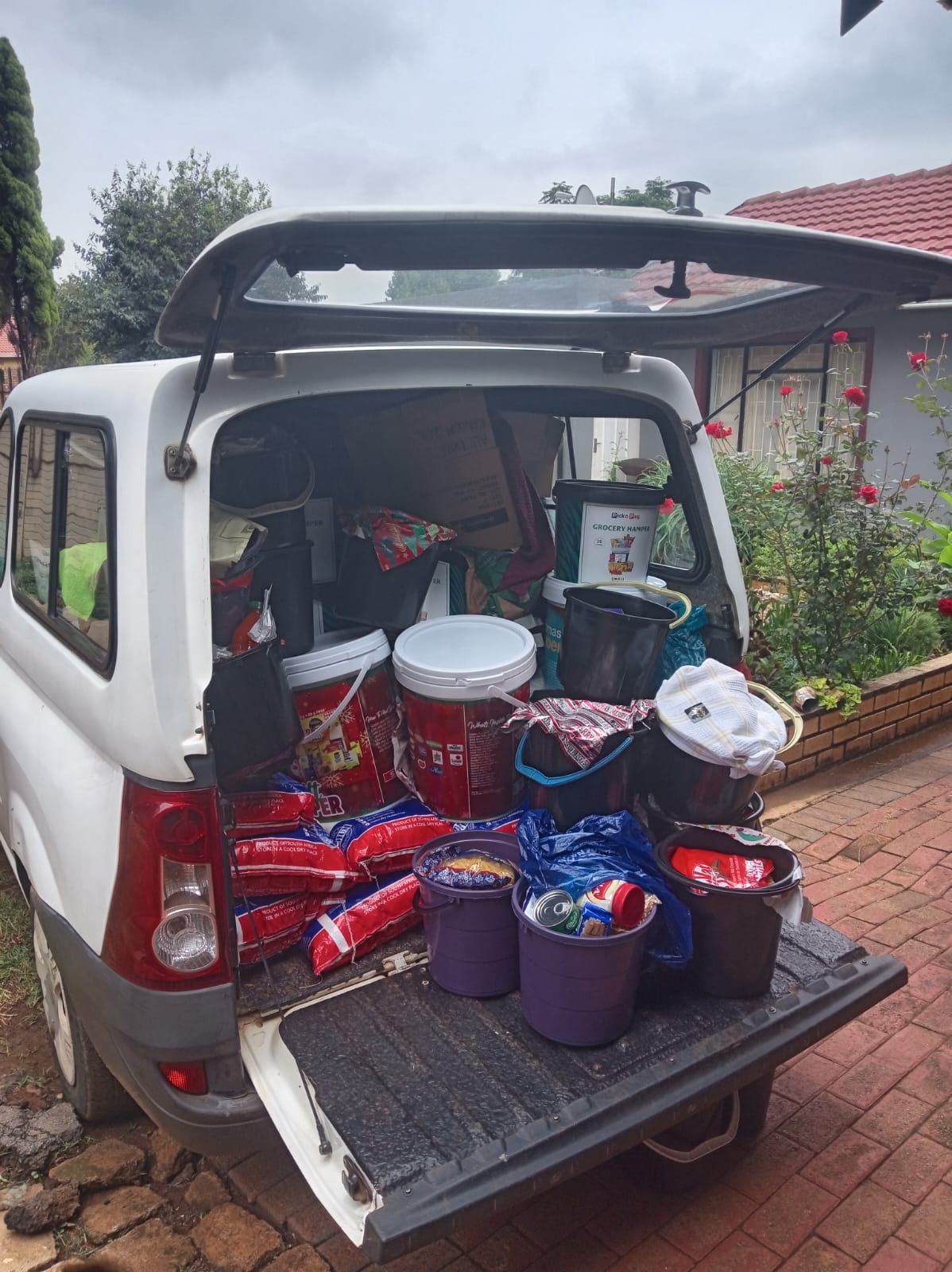 Sisters distributing food and support to women in community ministries