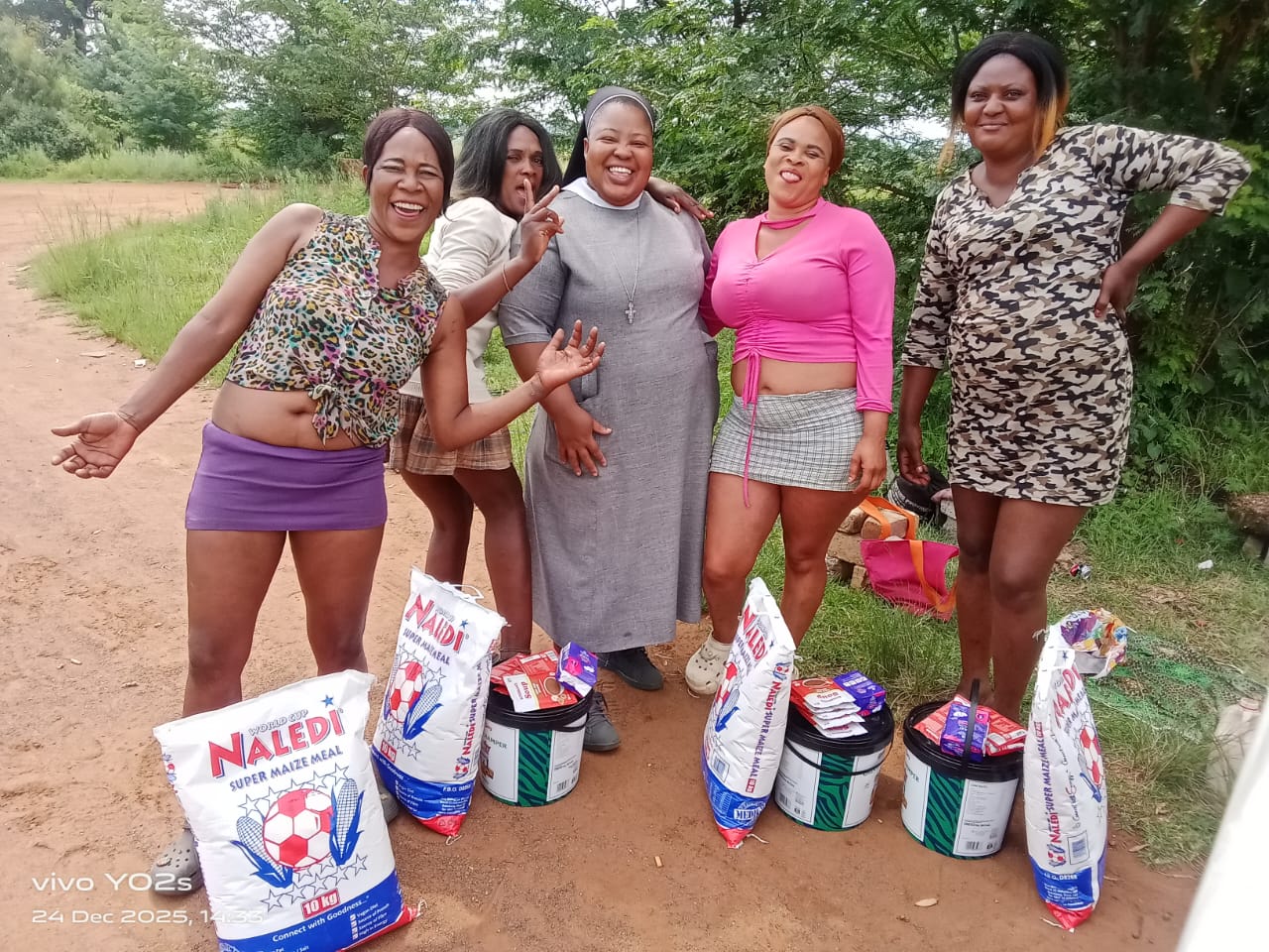 Community gathering for soup kitchen and food parcel distribution